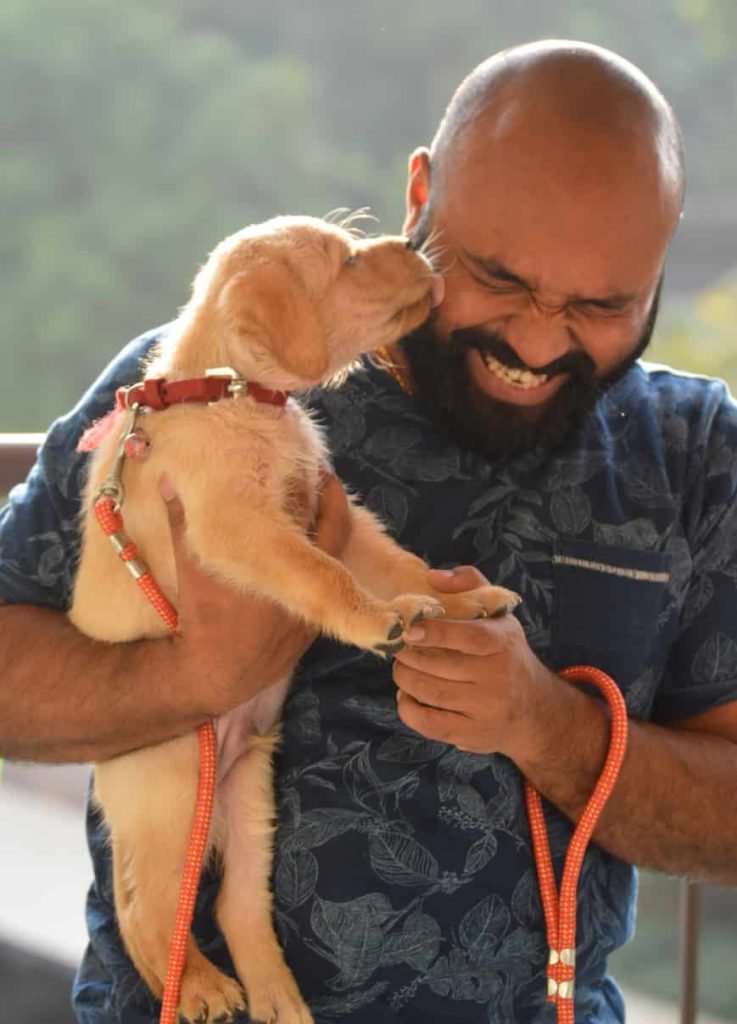 Man with puppy